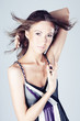 Young asian fashion woman posing in studio