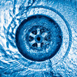 Swirl of water going down the sink