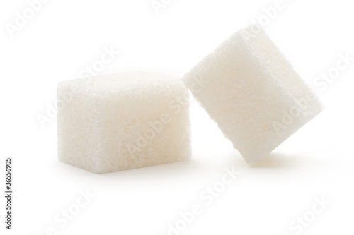 Photo: Sugar isolated on the white background Sugar isolated on the white background