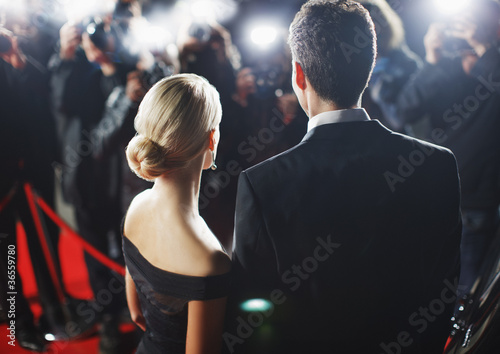 Foto: Celebrities posing for paparazzi on red carpet Celebrities posing for paparazzi on red carpet