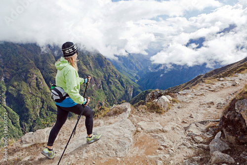 Photo: Woman hiking in Himalaya Mountains Woman hiking in Himalaya Mountains