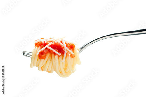 Photo: Fork with spaghetti, tomato sauce and cheese Fork with spaghetti, tomato sauce and cheese