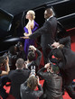 Bodyguard protecting celebrity from paparazzi