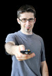 Photo: Young man using remote control Young man using remote control
