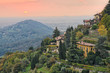 Sun setting over countryside outside Bergamo, Lombardy, Italy