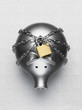 Padlock and chain around piggy bank