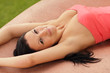 Sexy woman laying in the park