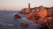 Foto: Lighthouse on rocky coastline Lighthouse on rocky coastline