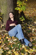 woman sleeping under a tree
