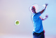 Blurred view of tennis player swinging racket
