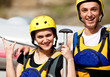 Happy couple with helmets