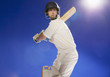 Cricket player holding bat
