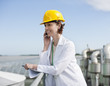 Scientist talking on cell phone outdoors