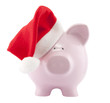 Piggy bank with Santa Claus hat. Clipping path included. Piggy bank with Santa Claus hat. Clipping path included.