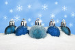 Blue baubles in the snow