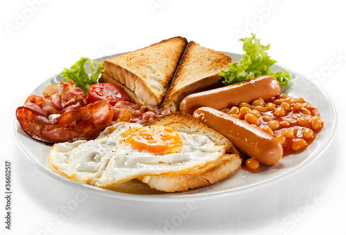 Photo: English breakfast - toast, egg, bacon and vegetables English breakfast - toast, egg, bacon and vegetables