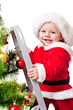 Photo: Laughing toddler on step ladder Laughing toddler on step ladder