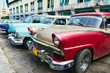 Foto: Havana, Cuba. Street scene with old cars. Havana, Cuba. Street scene with old cars.