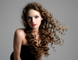 Glamour woman with curly hair