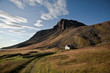 Landscape with old house in the mountains in Iceland