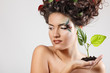 teen girl beautiful ecology with green tree shoot