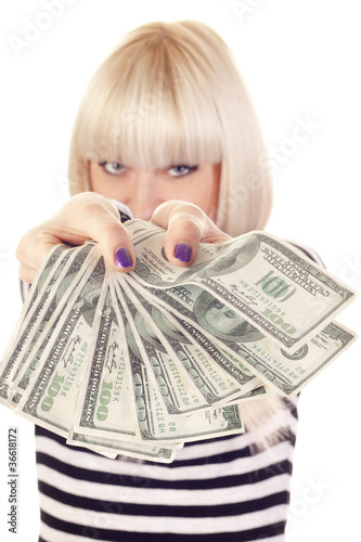 Photo: Beautiful smiling woman holding cash Beautiful smiling woman holding cash