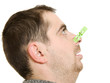 A patient man with a stuffy nose on a white background.
