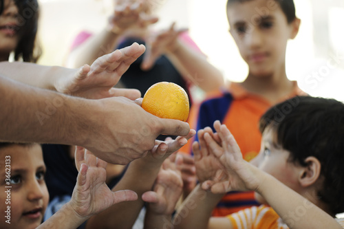 Photo: Hungry children in refugee camp, humanitarian food Hungry children in refugee camp, humanitarian food