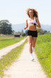 Junge Frau beim joggen
