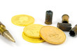 Patrone und Goldmünze