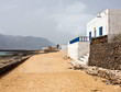 Street by the sea on the island of La Graciosa in Canary Islands