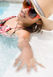 Young woman in the pool