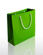 Green paper bag on reflect floor and white background Green paper bag on reflect floor and white background