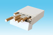 Photo: Cigarette pack with clipping path on a blue background Cigarette pack with clipping path on a blue background
