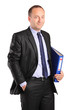 Portrait of a happy businessman holding a folder with documents Portrait of a happy businessman holding a folder with documents