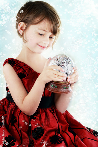 Photo: Child with Snow Globe Child with Snow Globe