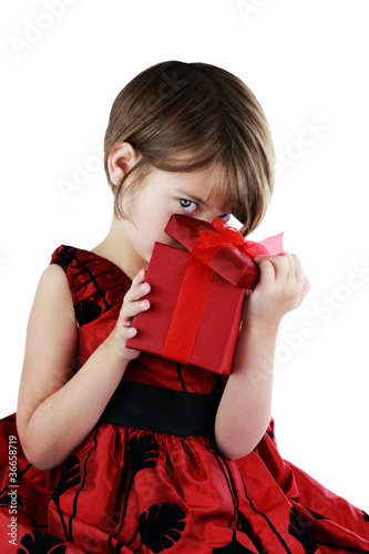 Photo: Child Peeking Into Giftbox Child Peeking Into Giftbox