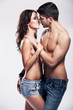Photo: Happy passionate heterosexual couple in studio Happy passionate heterosexual couple in studio