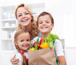 Happy family with the groceries Happy family with the groceries