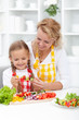 Mother and child preparing food Mother and child preparing food