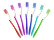 seven multi-colored toothbrushes isolated on white