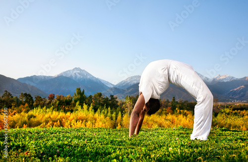 Photo: Yoga chakrasana wheel pose Yoga chakrasana wheel pose