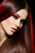 Woman model with shiny long hair, evening make-up