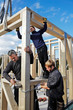 carpenters setting up prefabricated framework