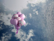multicolored balloons in the sky