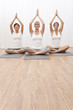 Interracial Group of Three Beautiful Women In Yoga Position