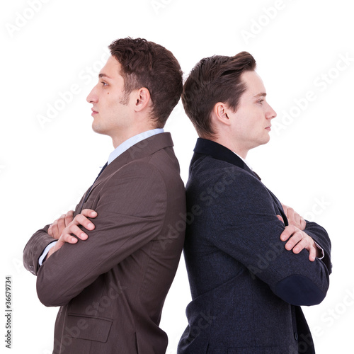 Photo: back to back businessmen back to back businessmen