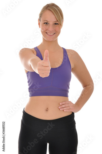 Foto: Junge Frau im Sportdress "Daumen rauf" Junge Frau im Sportdress "Daumen rauf"