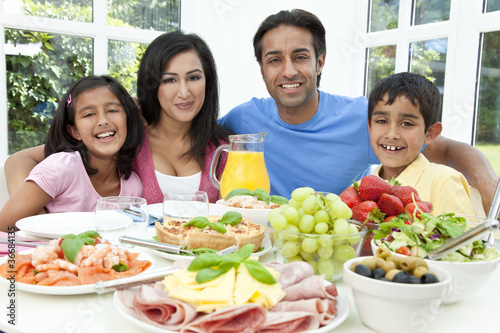Photo: Asian Indian Parents Children Family Eating Healthy Food Asian Indian Parents Children Family Eating Healthy Food