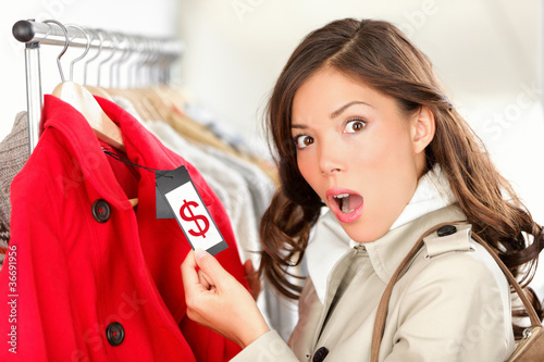 Photo: shopping woman shocked over expensive price shopping woman shocked over expensive price